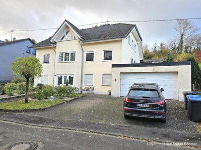 Dreifamilienhaus mit großem Grundstück und vielen Extras in Butzweiler