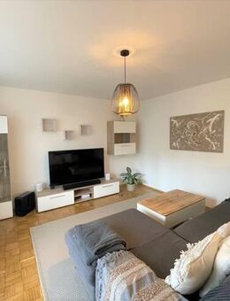 E & Co. - Ruhige 2,5-Zimmer Maisonettewohnung mit Südterrasse und großem Privatgarten - München
