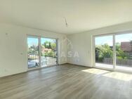 Erstbezug: Neubau-Obergeschosswohnung mit Süd-Balkon im Zentrum von Dörpen! - Dörpen