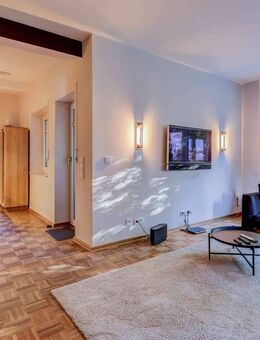 Renovierte Erdgeschosswohnung mit Garten & TG-Stellplatz - Vermietetes Altbaujuwel in zentraler Lage - Bad Homburg (Höhe)