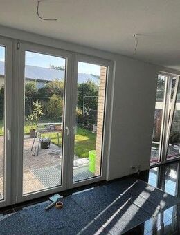 Neuss-Reuschenberg, Wohnung im EG eines Zweifamilienhauses mit großem Garten - Neuss