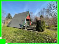 Idyllisches Gartengrundstück (Pacht) bebaut mit einer Finnhütte, Nebengelass in Alleinlage - Glowe