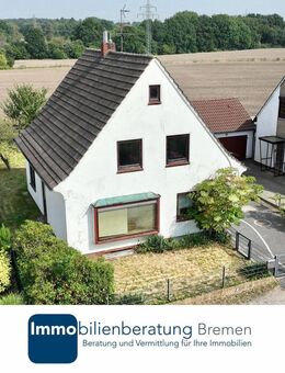 Freistehendes Einfamilienhaus mit beheiztem Wintergarten und Garage - Bremen
