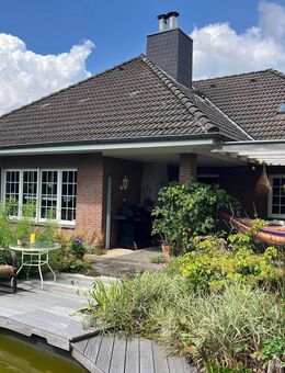 Charmantes Einfamilienhaus mit Keller, Einliegerwohnung, Teich und Doppelgarage - Ratekau