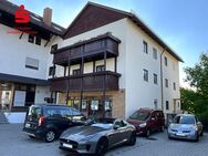 Mehrfamilienhaus mit drei Wohneinheiten, einer Gewerbeeinheit und Baureserven - Olching