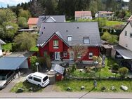 Elegantes Einfamilienhaus mit Einliegerwohnung, Garagen & Carport inmitten der Natur - Schmitten
