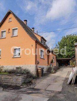 Familienfreundliches Einfamilienhaus mit Einliegerwohnung und Garten in Rauhenebrach - Rauhenebrach