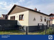 Großzügiges Einfamilienhaus mit Potenzial - Weitläufiges Grundstück & Zwei Garagen! In Büttelborn - Büttelborn