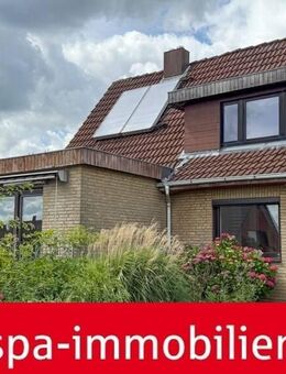 Solarthermie zur Warmwasserversorgung! Teilunterkellerte Doppelhaushälfte mit Garage und Terrasse - Sörup