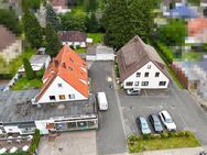 Attraktive Investitionsmöglichkeit: Zwei Mehrfamilienhäuser und ein Einfamilienhaus in Langen - Langen (Landkreis Cuxhaven)