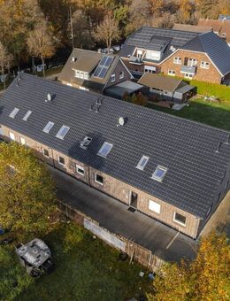 **Ruhige Lage, voller Potenzial - Mehrfamilienhaus mit 8 Parteien direkt am Splittingskanal** - Papenburg