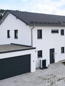 Erstbezug . Energieeffizienzhaus KfW 55 in familienfreundlicher Wohnlage direkt am Ortsrand - Langenenslingen