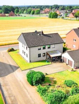 Alfhausen: Zweifamilienhaus mit doppeltem Mehrwert - Eigennutz plus Mieteinnahmen - Alfhausen