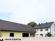 Schönes Zweifamilienhaus mit großem Garten und Garagen - Schnelldorf