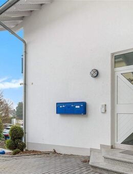 Attraktives Investment: Haus mit zwei Wohneinheiten, Gewerbefläche und vielen Stellplätzen in Wehrheim - Wehrheim