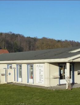 Attraktives Investment auf Rügen: Ferienwohnung und Geschäftslokal mit zusätzlichem Baugrundstück - Lietzow