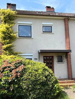 PURNHAGEN-IMMOBILIEN - Blumenthal/Lüssum, Reihenmittelhaus mit Doppelgarage in ruhiger Wohnlage - Bremen