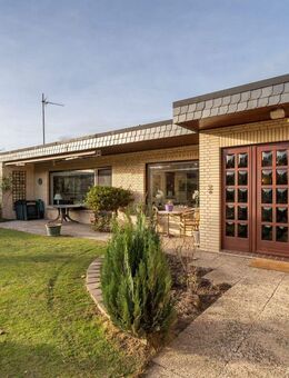 ***Stilvoll erweiterter Bungalow mit offenem Wohnbereich in attraktiver Lage von Syke-Barrien - Syke