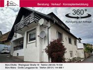 Charmantes Zweifamilienhaus mit vielseitig nutzbarem Untergeschoss und großem Innenhof - Partenheim