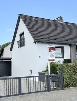 Attraktives 5-Zimmer-Einfamilienhaus mit Garten, Keller und geräumiger Doppelgarage im Ortskern - Rellingen