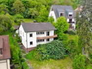 Platz für Ihre Familie und Ihre Ideen - Einfamilienhaus mit großem Garten - Höchberg
