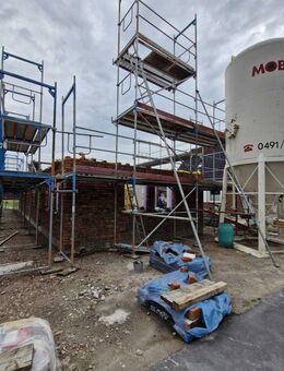 Esens - ruhige Innenstadt-Lage: Neubau Ferienwohnung im Obergeschoss mit Balkon - Esens