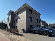 Exklusive 2-Zimmer-Etagenwohnung mit Balkon und Pkw-Stellplatz - Groß Nordende