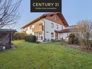 Doppelhaushälfte mit zwei Wohneinheiten und großem Garten - Vielseitig und charmant! - Tacherting