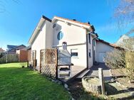 Stimmungsvolle Architektur: Einfamilienhaus mit Südgarten und Garage. - Beckum