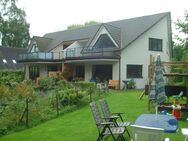 Freistehendes 4-Familien-Architektenhaus mit idyllischem Naturteich (inkl. 4 Garagen) in Niendorf - Hamburg