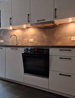 Charmante Erdgeschosswohnung mit Einbauküche. - Bunde
