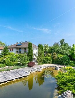 Klassische Ästhetik: Stilvolles Einfamilienhaus mit naturnah gestaltetem Traumgarten - Grünwald