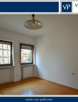Charmante Vier-Zimmer-Wohnung mit Kachelofen und Einbauküche in Repperndorf - Kitzingen