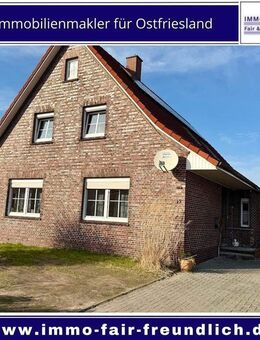 Einfamilienhaus mit Kaminofen, großem Grundstück und Doppelgarage in Aurich Egels - Aurich