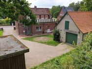 Charmantes Zwei-Familienhaus und Nebengebäude als Kapitalanlage in Wriedel - Wriedel