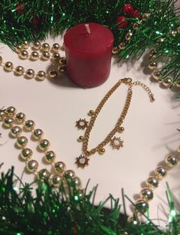 Elegantes goldfarbenes Armband mit Sonnenanhängern - Viernheim