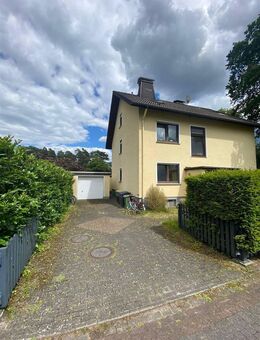 Mehrfamiliehaus in ruhiger Lage auf großen Grundstück mit zwei Garagen - Schloß Holte-Stukenbrock