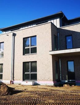 Neubau-Erstbezug: Moderne 4 Zi.-Wohnung mit Fahrstuhl und gr. Balkon - Travenbrück