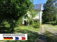 Einfamilienhaus in Stadtrandlage mit sehr großem Grundstück und 2 genehmigten Bauplätzen - Saarbrücken