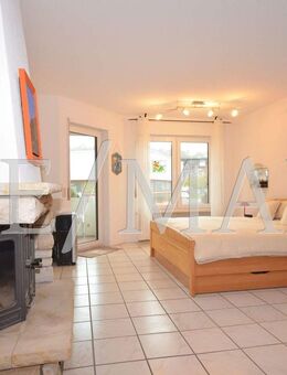 Gepflegte 2 Zimmer Eigentumswohnung mit Kamin, Einbauküche, Balkon und Stellplatz in Idstein - Idstein