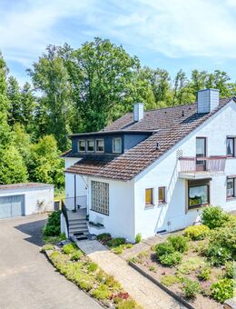 Großzügiges Zweifamilienhaus auf parkähnlichem Grundstück in Vögelsen - Vögelsen