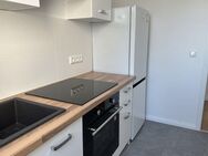 Renovierte 2-Zimmer-Wohnung in beliebter Lage von Putbus mit Einbauküche und Stellplatz - Putbus