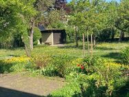 RARITÄT familienfreundliche Gartenwohnung mit 4 Schlafzimmern, Hobbykeller und Garage - München