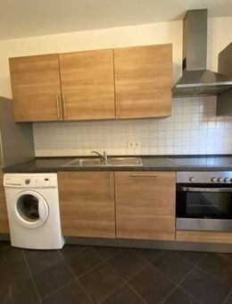 Doppelhaushälfte - Charmanter 3-ZKB-Bungalow mit Gartenanteil in ruhiger Lage von Gillenfeld - Gillenfeld