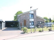Schickes, familiengerechtes Wohnhaus mit Doppelcarport, Pool und überdachter Terrasse - Lastrup