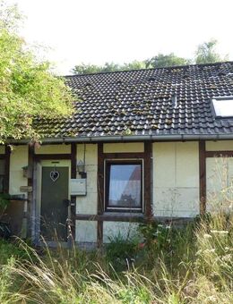 Einzigartige Split-Level-Architektur: Sanierungsbedürftiges Einfamilienhaus mit großem Garten! - Otzberg