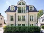 AIGNER - Stadtvilla: Eleganz trifft Natur - Repräsentative Gartenwohnung in Bestlage Harlachings - München