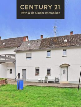 Zweifamilienhaus mit Baulücke - Kapitalanlage oder Eigennutzung - Ehringshausen