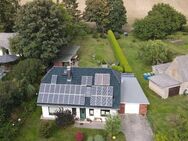 Einfamilienhaus mit überdachter Terrasse, Kamin, Garage und Photovoltaik- und Solaranlage - Gottesgabe