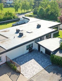 Provisionsfrei! Modernisierter Flachdachbungalow mit großem Garten in Erftstadt-Friesheim - Erftstadt